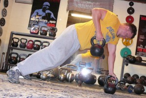 One way to get more motivated about fitness is to make it more fun by trying new exercises, such as lifting kettlebells like AHF writer Aaron Dorksen is pictured doing.